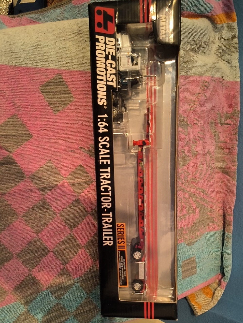 Peterbilt Die-Cast PromotionsDie-Cast Metal 1:64 Scale Red Tractor-Trailer Model
